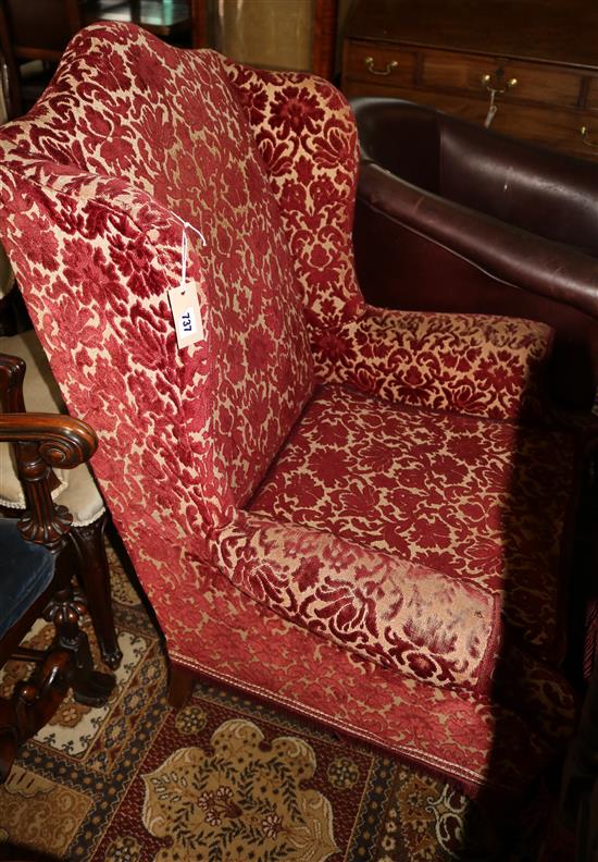 Upholstered wing armchair(-)